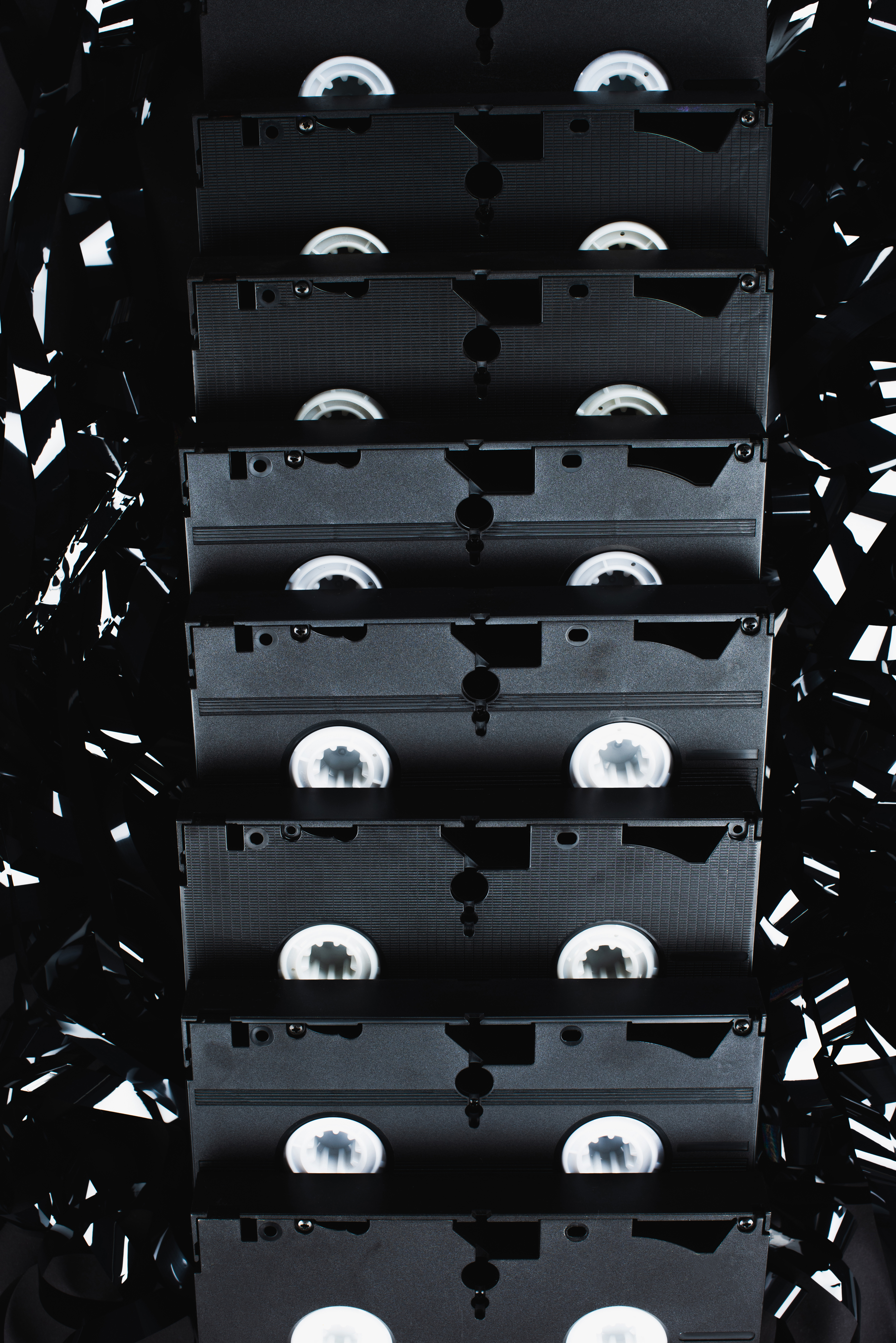 Top view of vintage VHS cassettes aligned symmetrically